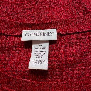Catherine’s tunic length light weight knitted sweater with three inch side split